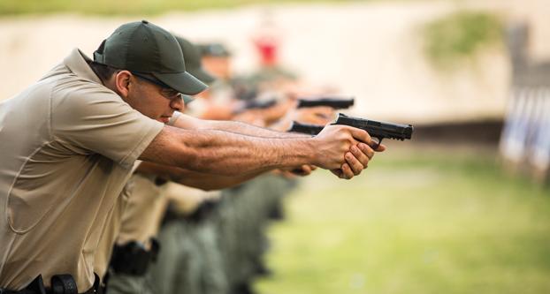 Fresno State students practicing their dry firing during their training on Monday, April 20 at the sheriffs office range. (Ricky Gutierrez/The Collegian)