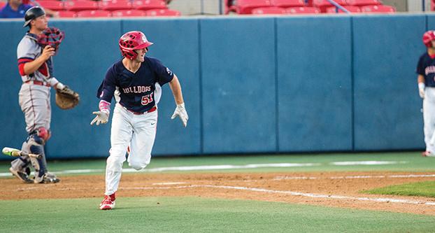 Fresno State junior outfielder Jake Stone runs to first base after recording a base hit during Tuesday’s nonconference matchup against Saint Mary’s. (Ricky Gutierrez/The Collegian)