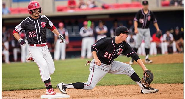 Fresno State freshman outfielder Zach Ashford (32) reaches first base during Sunday’s Mountain West Conference matchup against San Diego State at Pete Beiden Field at Bob Bennett Stadium. (Ricky Gutierrez/The Collegian)