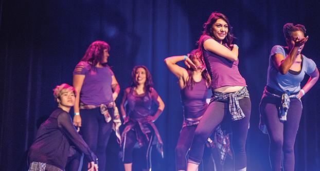 The Midnight Dance Team performs during the Women’s Art and Music Festival of Fresno. (Khone Saysamongdy/The Collegian)