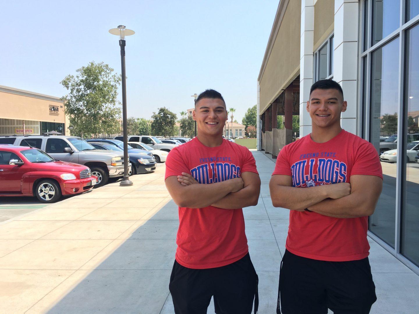 Twin brothers Eduardo and Edgar Madrigal will be two of seven male cheerleaders for Fresno State this season. (Marina McElwee/The Collegian)