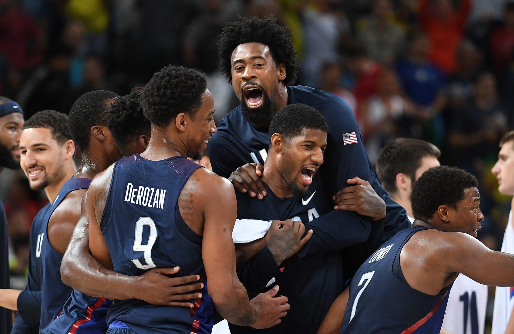 Former Bulldog Paul George celebrates with teammates after winning the gold medal on Sunday, Aug. 21, 2016 at the Rio 2016 Olympics in Brazil. (Wally Skalij/Los Angeles Times)