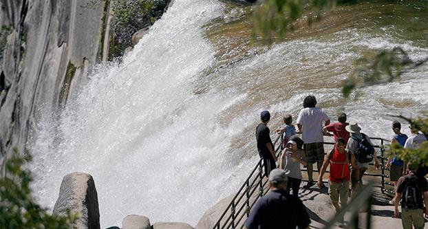 Hikers reach the vista point at Vernal Fall in Yosemite National Park in California on Wednesday, July 20, 2011. Three visitors reportedly died after getting swept over the waterfall on Tuesday. (Eric Paul Zamora/Fresno Bee/MCT)