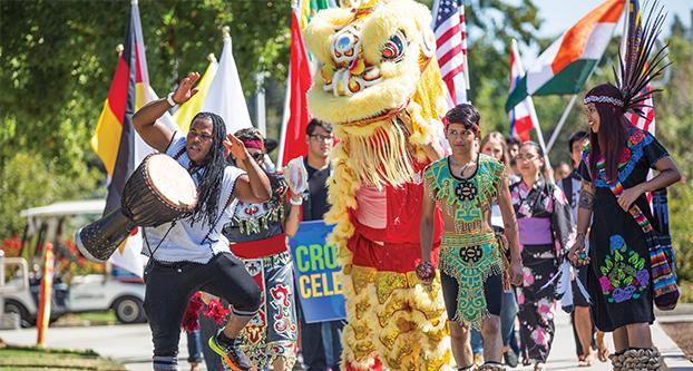 Fresno State students march in a parade through campus to celebrate the beginning of Cross Cultural Celebration Week on Sept. 26, 2016. (Khone   Saysamongdy/The Collegian)
