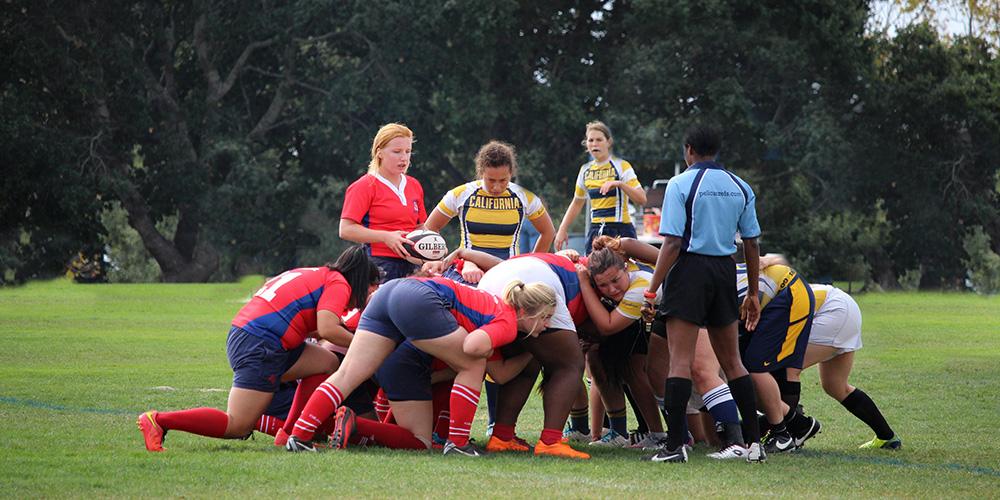 The 2015 women’s rugby club battling for the ball in a scrum against California. (Courtesy of Fresno State Women’s Rugby Club)