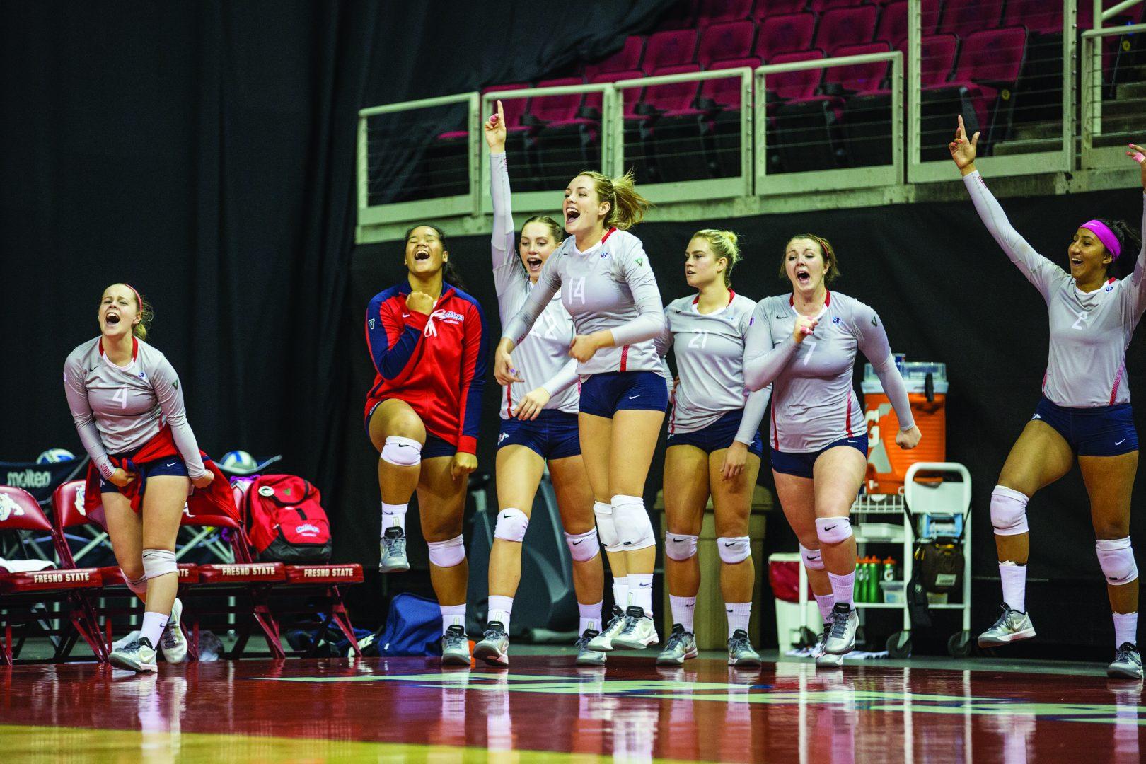 The+Fresno+State+volleyball+team+celebrates+getting+their+first+conference+win+of+the+season+defeating+New+Mexico+3-0+on+Saturday+afternoon+at+the+Save+Mart+Center.+%28Khone+Saysamongdy%2FThe+Collegian%29