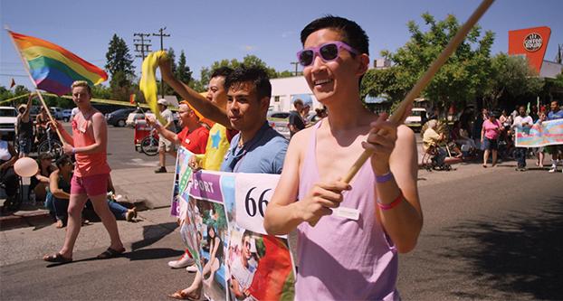 Justin Kamimoto, right, marches in the 25th Annual Rainbow Pride Parade and Festival in the Tower District on June 6, 2015. (Courtesy of Justin Kamimoto)