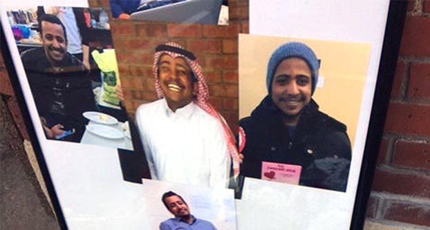 Photos are placed at the memorial for Hussain Saeed Alnahdi, 24, who died Monday, one day after being assaulted on a street in downtown Menomonie. (Karen Herzog/Milwaukee Journal Sentinel/TNS
