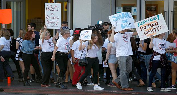Protestors join women who have accused Bill Cosby of sexual assault during a rally at Cosbys star on the Hollywood Walk of Fame in November 2015. Inspired by the case, the California Legislature on Tuesday, Aug. 30, 2016, sent the governor a bill to end the statute of limitations for prosecuting rape and other felony sex crimes. (Allen J. Schaben/Los Angeles Times/TNS)