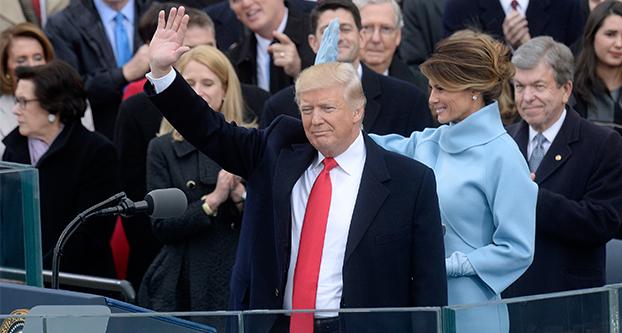 President Donald Trump waves after taking the oath of office during the 58th Presidential Inauguration on Jan. 20, 2017 in Washington, D.C. (Olivier Douliery/Abaca Press/TNS)