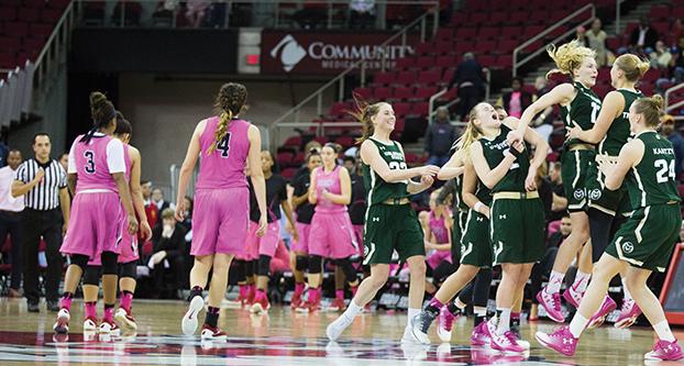 Players from the Fresno State womens basketball team walk off the court as Colorado State celebrates a 66-64 overtime victory against the Bulldogs at the Save Mart Center in Fresno, California on Saturday, Feb. 11, 2017. (Christian Ortuno/The Collegian)
