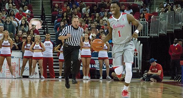 Redshirt junior guard Jaron Hopkins (#1) dribbles down the court against Colorado State on Jan. 18, 2017, at the Save Mart Center. (Christian Ortuno/The Collegian)