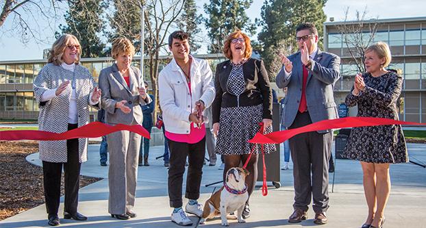Ishaq Ali cuts a ribbon in honor of the new social science quad on Feb. 14, 2017. Construction on the quad began before the fall semester of 2016, and reopened up in December of last year. (Khone Saysamongdy/The Collegian)