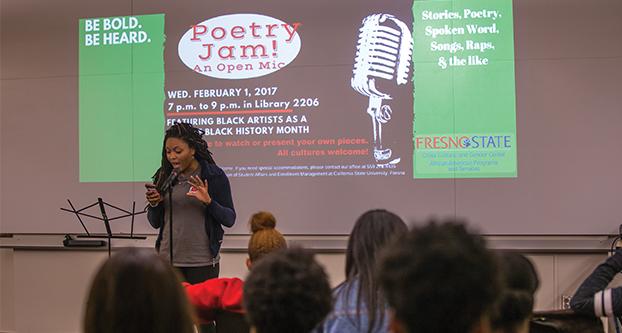 Charie’ Payne shares one of her poems at the Henry Madden Library in room 2206 during the Poetry Jam event on Feb. 1, 2017.  (Khone Saysamongdy/ The Collegian)