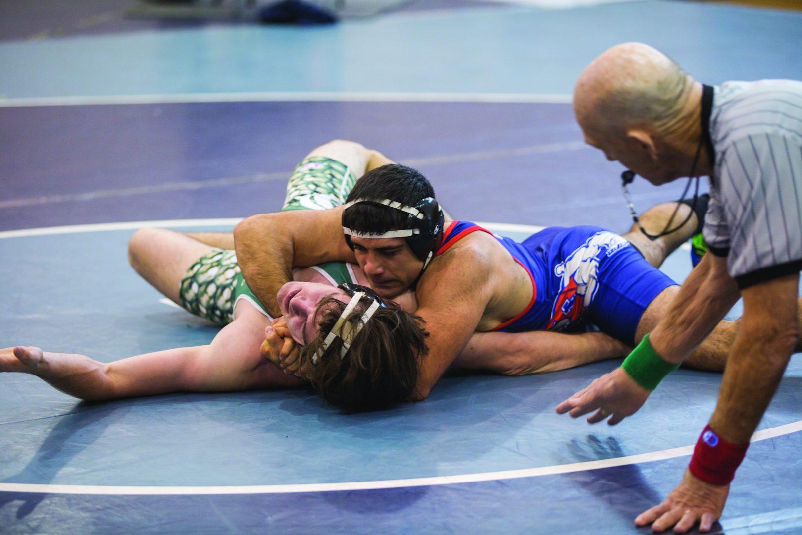 Fresno+State+wrestler+Davit+Gevorgyan+attempts+to+pin+CSU+Sacramento%E2%80%99s+Teddy+Anderson.+He+during+the+NCWA+California+State+Championship+hosted+at+Fresno+State+on+Feb.+11%2C+2017.+%28Daniel+Avalos%2F+The+Collegian%29