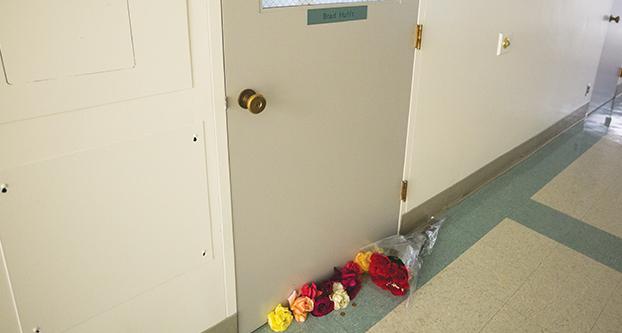 Flowers left at the office door of Music professor Bradley Hufft on Monday, April 17, 2017. The flowers were placed in the Music building to honor the late professor who passed away Thursday, April 13, 2107. (Daniel Avalos/The Collegian)