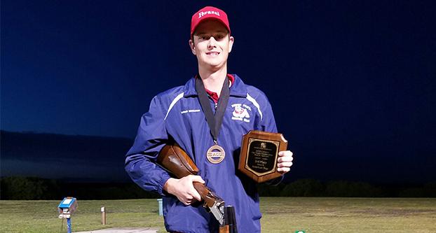 Junior Logan Engelman holding a plaque he won for placing third in the nation in the open class for trap shooting on April 2, 2017, in San Antonio, Texas. (Courtesy of the Fresno State shooting team) 