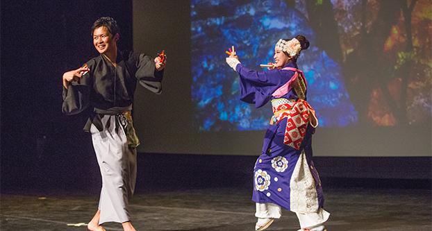 IMG_9537: Masahiro Sakaida (left) and Mei Fukata (right), performs the Yosakoi dance in the Satellite Student Union during Japanese culture night for Amerasia Week on April 3, 2017. Yosakoi dance originated in Japan and is performed at festivals and events all over the country. (Khone Saysamongdy/ The Collegian)