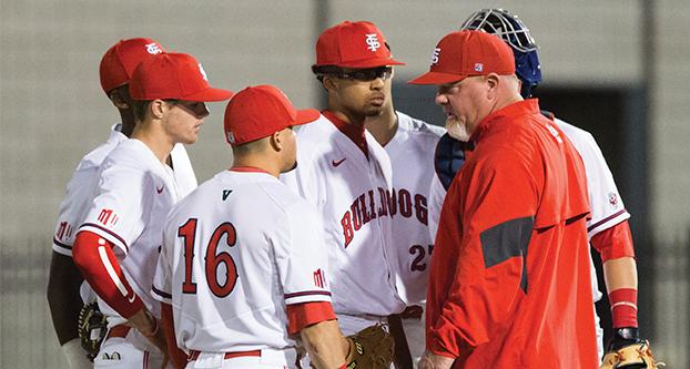 Fresno State head baseball coach Mike Batesole talks to the pitcher and infielders on Feb. 24, 2017, against UC Riverside at Pete Beiden Field at Bob Bennett Stadium. (Christian Ortuno/ The Collegian)