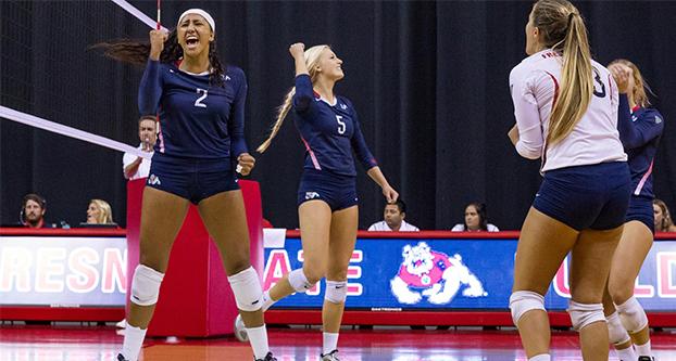 Senior Lauren Torres (#2) celebrates in a volleyball match while playing for Fresno State. (Fresno State Athletics)