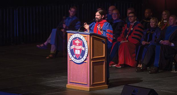 Jes Therkelsen Speaks in front of a crowd of a couple thousand new students. Therkelsen was elected to be the keynote speaker at the New Student Convocation at the Save Mart Center on Aug. 21, 2017. (Daniel Avalos/ The Collegian)