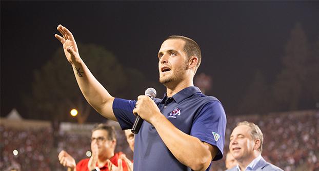 Former Fresno State quarterback and current Oakland Raider Derek Carr speaks to the crowd during his jersey retirement ceremony. The ceremony took place at half time in Fresno State’s 66-0 win against Incarnate Word on Saturday, Sept. 2, 2017. (Megan Trindad/ The Collegian)