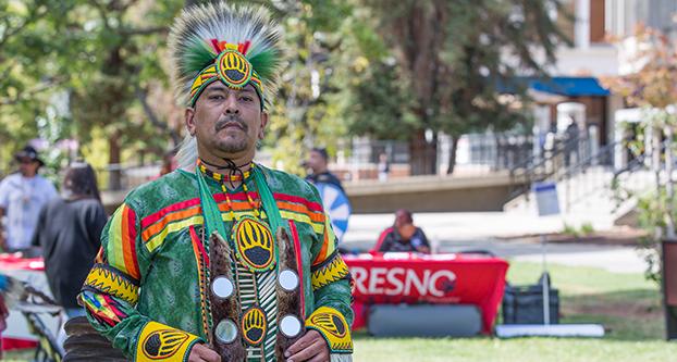 Northern traditional dancer of the Yaqui Tribe, Jose Red Sky, shows his regalia on Sept. 21, 2017. Red Sky’s outfit features hand made beadwork and wears  it when he dances which is how he celebrates his heritage. (Daniel Avalos/The Collegian)
