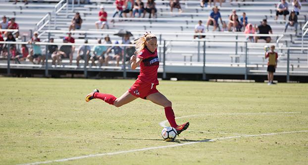 Fresno State sophomore forward Julia Glaser attempts a shot against Utah State on Sept. 24, 2017. The Bulldogs lost the game 1-0.  (Megan Trindad/The Collegian)