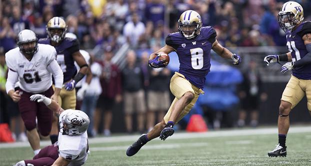 Washington wide receiver Dante Pettis (8) runs with the ball against Montana on Sept. 9, 2017 at Husky Stadium in Seattle, Washington. The Huskies beat Montana 63-7. (Molly Duttry/The Daily of the University of Washington)