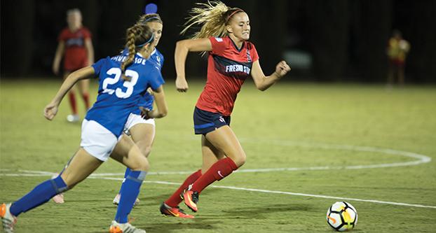 Fresno State forward Julia Glaser challenging UC Riversides defense on Sept. 15, 2017 at the Soccer & Lacrosse Stadium. The Dogs won UC Riverside in overtime, 1-0. (Daniel Avalos/ The Collegian). 