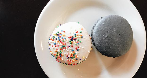 A birthday cake flavored macaroon and an Oreo flavored macaroon from Le Parisien Cafe. (Selina Falcon/The Collegian)