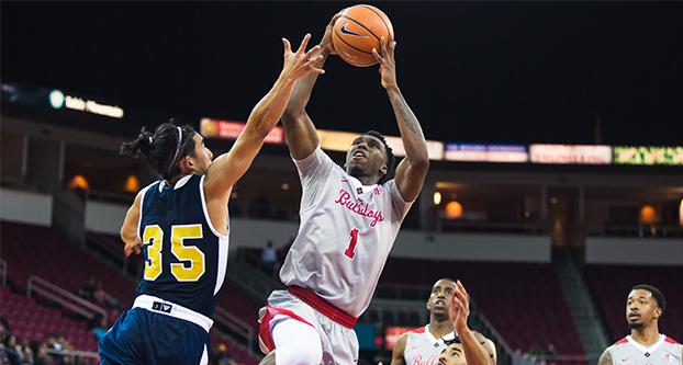 Fresno State senior guard Jaron Hopkins drives to the basket (1) against UC Merced on Nov. 3, 2017 at the Save Mart Center. The Bulldogs won 79-39. (Alejandro Soto/The Collegian) 
