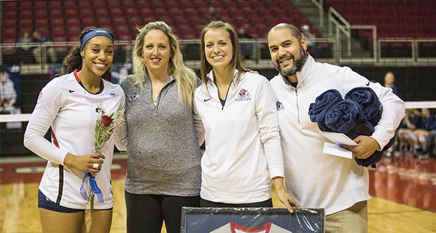 Former Fresno State head volleyball coach Lauren Netherby-Sewell (second from left) will not be retained. (Collegian file photo) 