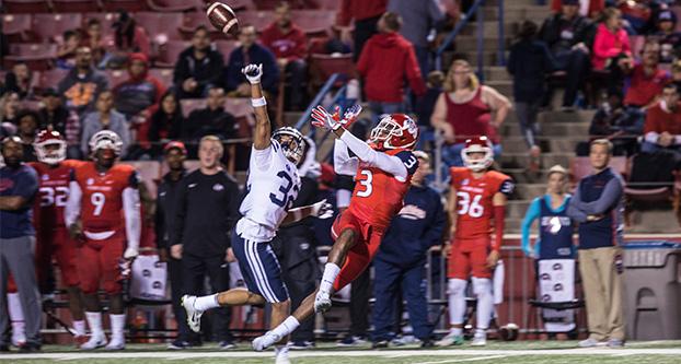 Fresno State wide receiver KeeSean Johnson attempting a catch against BYU defensive back Chris Wilcox on Nov. 4, 2017 at Bulldog Stadium. The ‘Dogs won 20-13 and are now bowl eligible (Daniel Avalos/ The Collegian)
