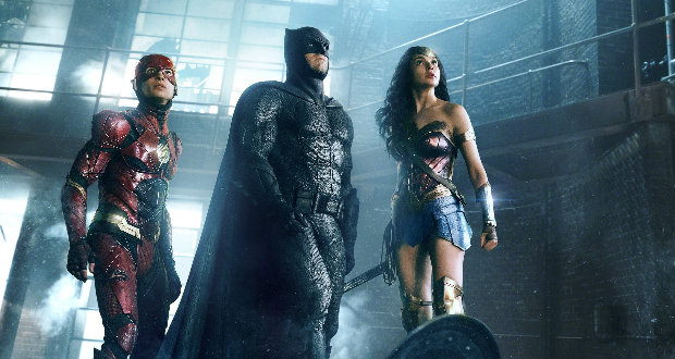 Ezra Miller as The Flash, Ben Affleck as Batman and Gal Gadot as Wonder Woman in the film ‘Justice League.’ (Warner Bros. Pictures)