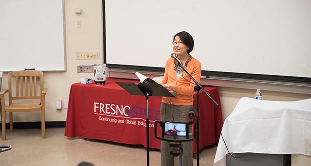 Mai+Neng+Moua+speaks+to+an+audience+about+her+book+%E2%80%9CThe+Bride+Price%3A+A+Hmong+Wedding+Story%E2%80%9D+at+Fresno+State+on+Friday%2C+Nov.+17.++%28Megan+Trindad%2FThe+Collegian%29