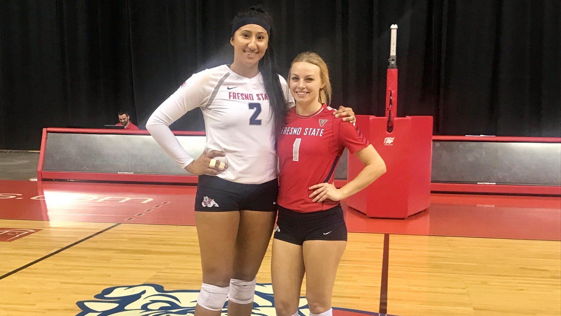 Seniors Lauren Torres (2) and Jacqueline Hutcheson (1) after winning 3-1 against Wyoming at the Save Mart Center on Nov, 18, 2017. (Vanessa Romo/ The Collegian)