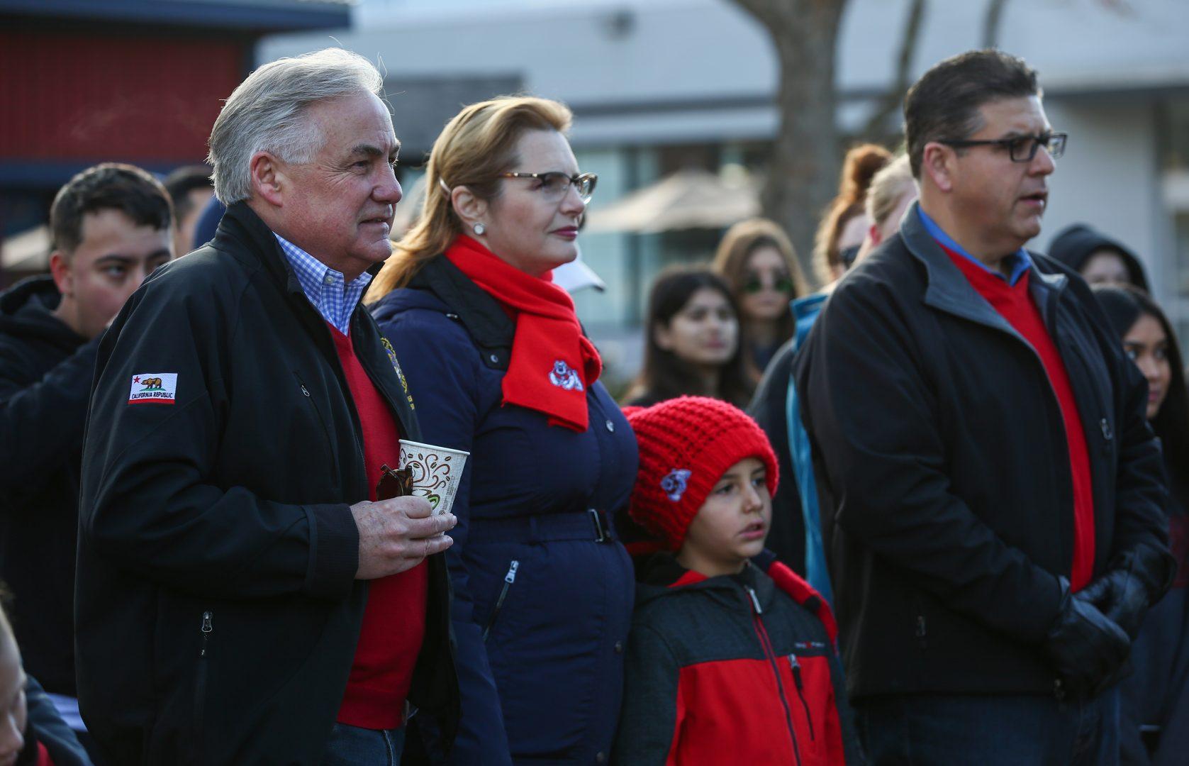 Assemblyman Jim Patterson stands with President Joseph Castro and family during the drug awareness walk hosted by Associated Students Inc. (ASI) on Saturday, Jan. 20, 2018 in front of the Henry Madden Library. ASI coordinated the drug awareness walk in response to the death of Omar Nemeth, a Fresno State student who died due an apparent drug overdose. (Alejandro Soto/The Collegian)