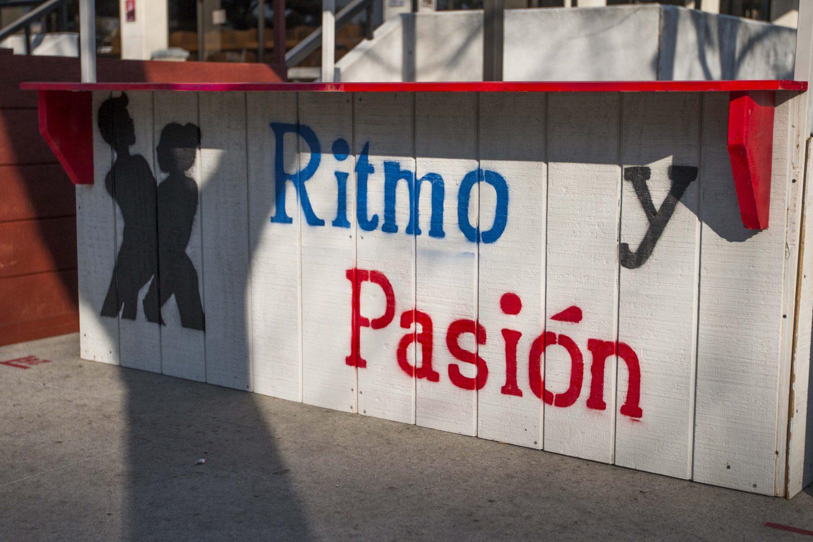 The Ritmo y PasiÃ³n booth in front of the University Student Union. (Benjamin Cruz/The Collegian)