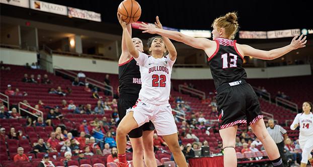 Freshman Aly Gamez attempts a shot against Eastern Washington guard Lea Wolff on Nov. 12, 2017 at the Save Mart Center. (Collegian File Photo) 

