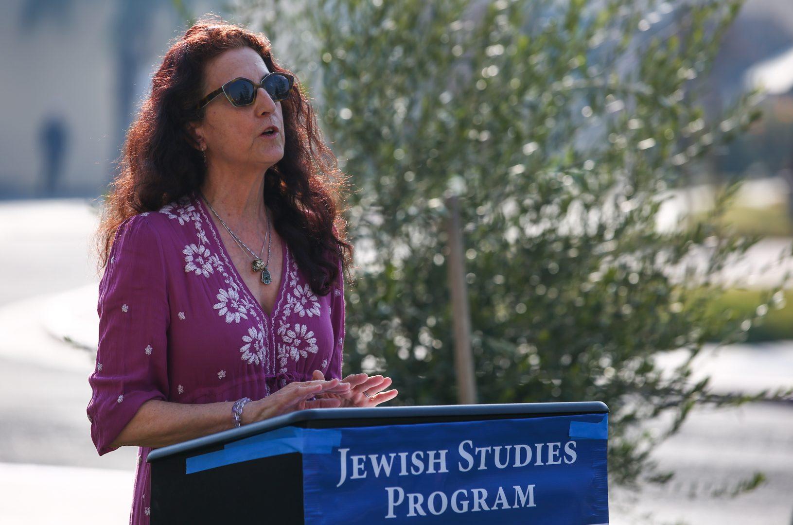 Professor of History, Jill Fields speaks to a crowd of students and faculty during a tree planting ceremony hosted by the Jewish Studies Program on Jan. 31, 2018 near the Social Science building. (Alejandro Soto/The Collegian)