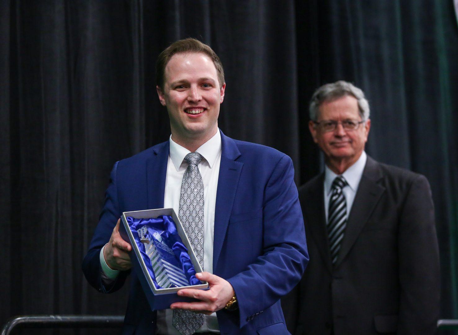 Fresno State alumnus Daniel Malcom wins the Student Entrepreneur Award for his Sparkle Ties at the Fresno Chamber of Commerce Entrepreneur of the Year awards on Tuesday, Feb. 13, at The New Exhibit Hall in downtown Fresno. (Alejandro Soto/The Collegian)