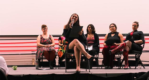 A member of Fresno State’s ‘The Vagina Monologues’ cast delivers a solo monologue about sexuality and embarrassment in the North Gym Thursday, Feb. 8. (Aly Honore/The Collegian)