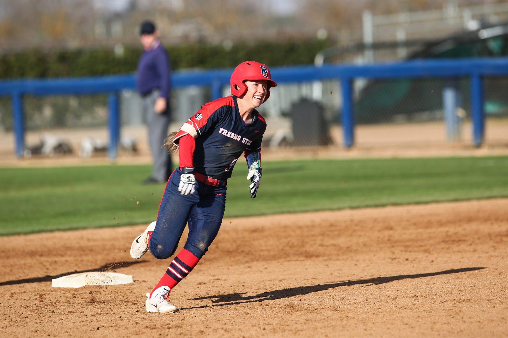 Sophomore Miranda Rohleder as she rounds second base after a triple in the third inning. The Dogs wrapped up the Bulldog Classic at Margie Wright Stadium on Feb. 18, 2018.  (Alejandro Soto/ The Collegian)