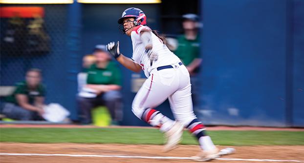 Sophomore Hayleigh Galvan runs to first base at Fresno State’s first game against Cleveland State at the Margie Wright Diamond on March 9, 2018. The Bulldogs won 9-0. (Ram Reyes/ The Collegian) 