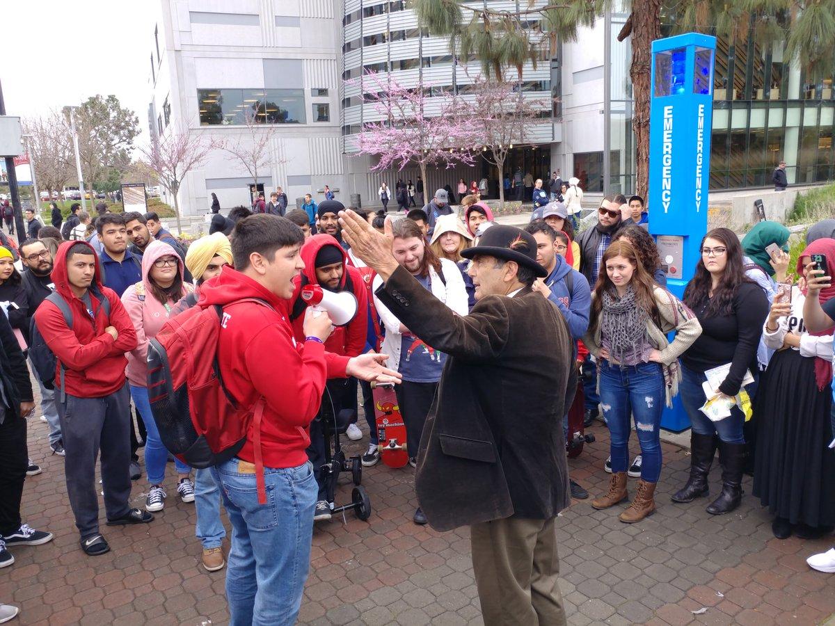 A preacher from The Campus Ministry USA and a Fresno State student argue Tuesday, March 20, 2018 during a campus visit by the ministry group. Jed Smock, the preacher in the brown coat, said the visit was successful after several students gathered to listen to him speak. Students shouted their arguments. (Cresencio Rodriguez-Delgado/The Collegian)