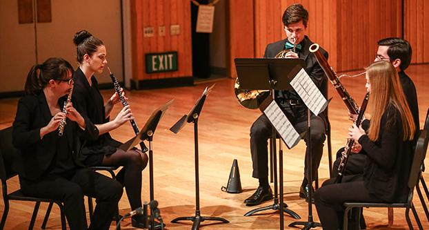 The President’s Quintet performs “The Traveler’s Tale” on March 4, 2018 at the music department Concert Hall for a memorial tribute to Dr. Brad Hufft. Hufft wrote “The Traveler’s Tale” specifically for the quintet in 2007 after an inspiring research trip to New Mexico. (Alejandro Soto/The Collegian)