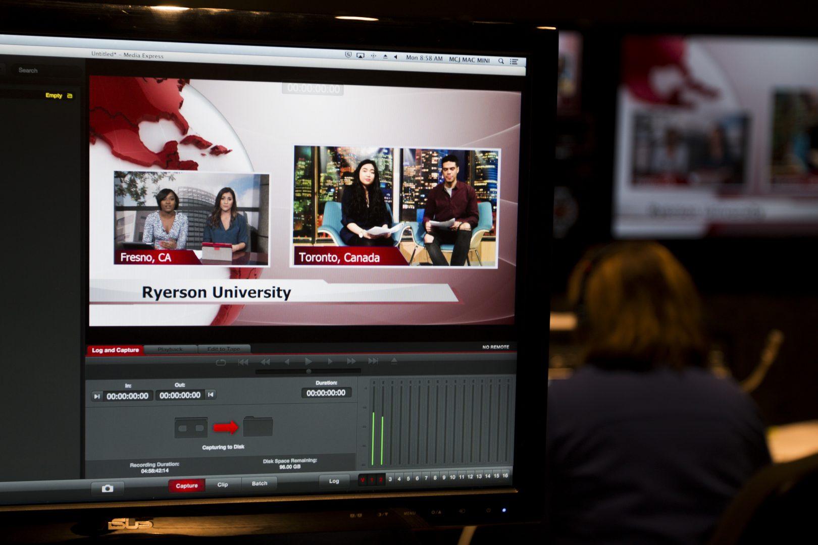 Deja Wright and Vanessa Romo talk to fellow student broadcasters from Ryerson University in Toronto, Canada during the Global News Relay on April 23, 2018.