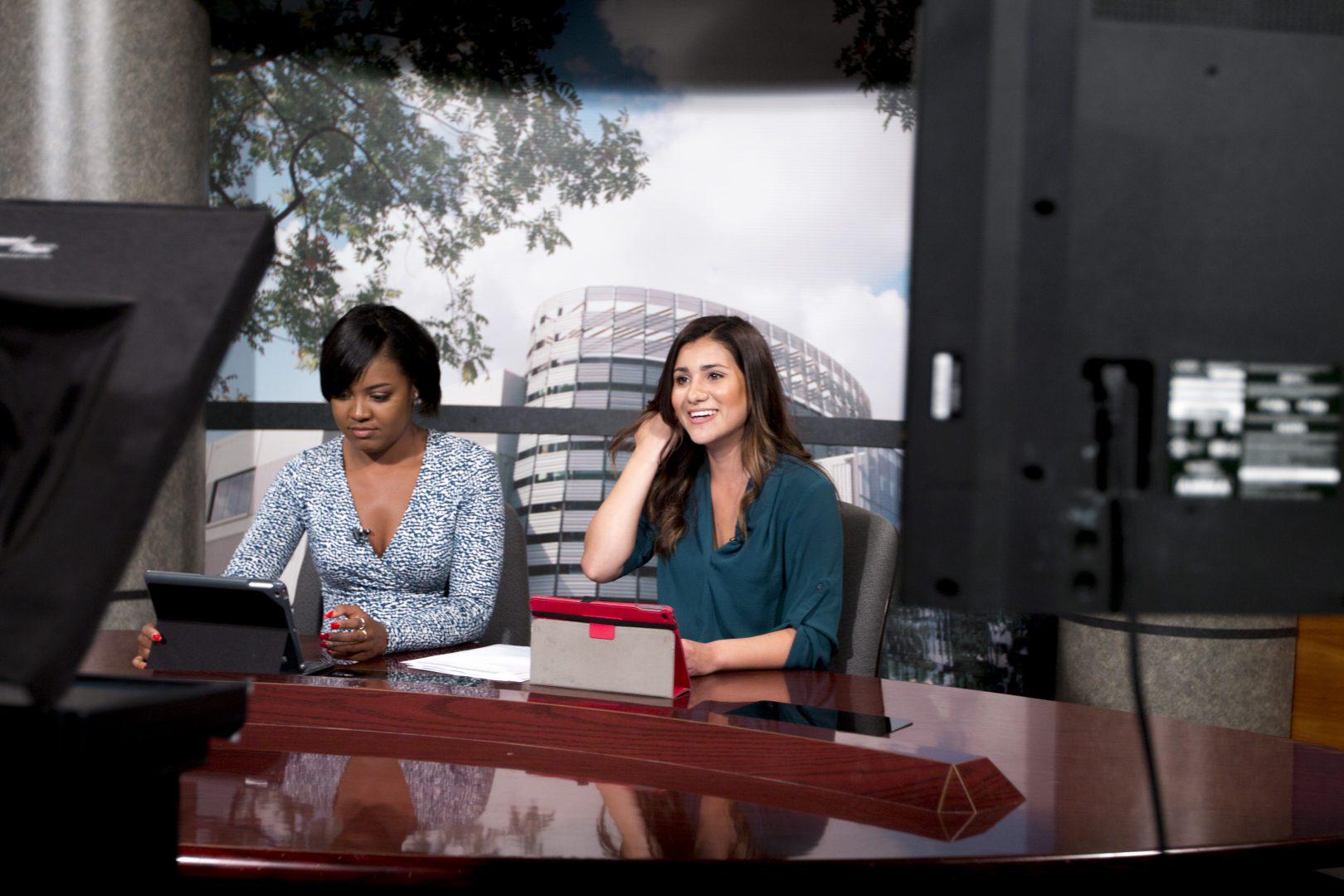 Broadcast students Deja Wright and Vanessa Romo finish their broadcast during the Global News Relay on April 23, 2018.