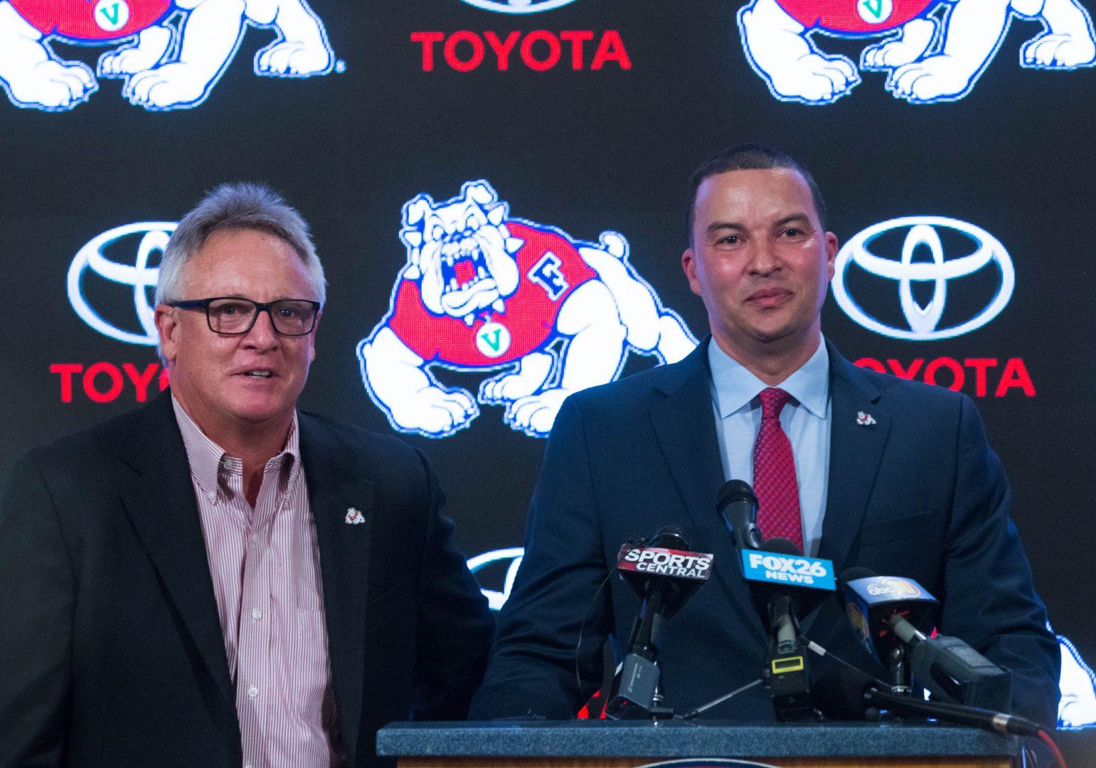 Senior Associate Athletic Director for External Relations introduces San Diego State Associate Head Coach Justin Huston during a press conference held at the Save Mart Center on April 5, 2018. (Alyssa Honore/The Collegian)